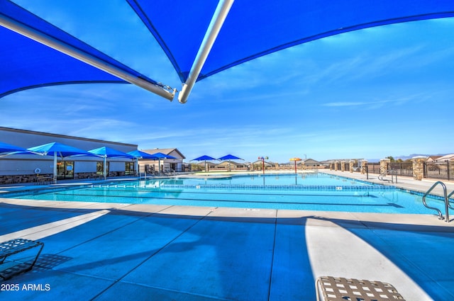 pool featuring a patio area