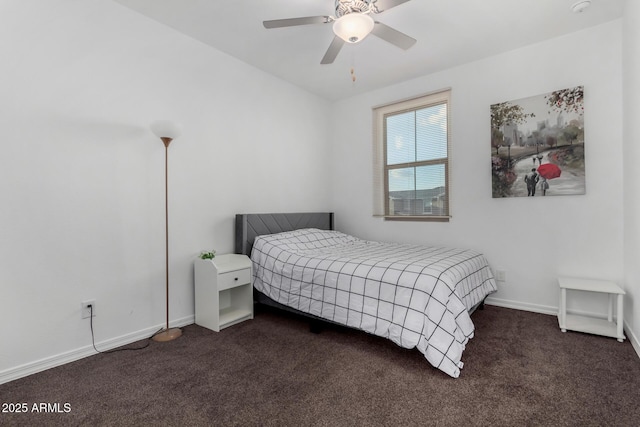 bedroom featuring ceiling fan and dark colored carpet