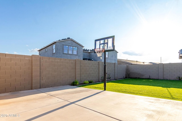 view of patio / terrace with basketball hoop