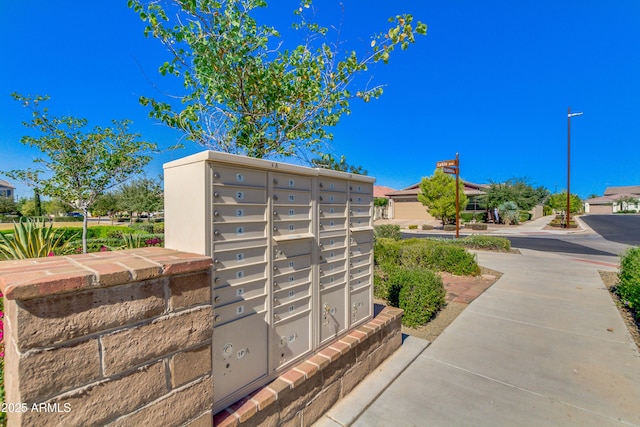 view of property's community with a mail area