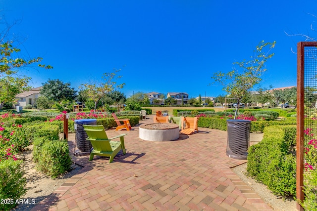 view of patio with an outdoor fire pit