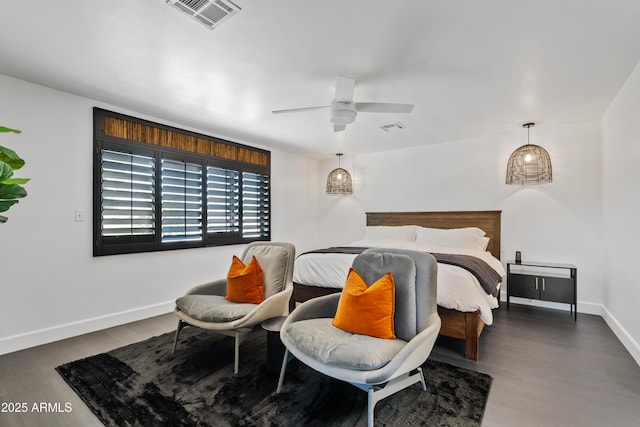 101 E Linger Ln, Phoenix, AZ 85020 - bedroom featuring wood finished floors and baseboards