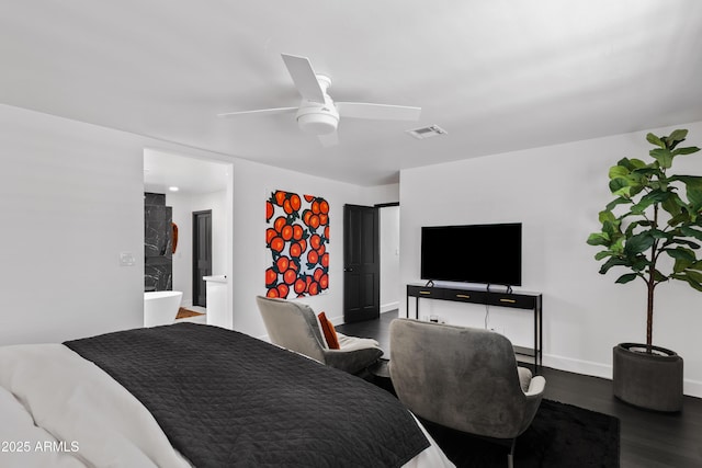 101 E Linger Ln, Phoenix, AZ 85020 - bedroom featuring wood finished floors, baseboards, and a ceiling fan