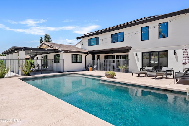 101 E Linger Ln, Phoenix, AZ 85020 - back of property with a ceiling fan, fence, a patio, and stucco siding
