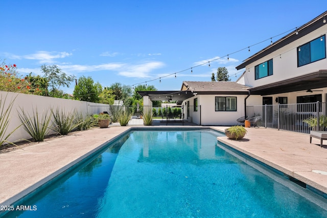 101 E Linger Ln, Phoenix, AZ 85020 - view of pool featuring a ceiling fan, fence, and a patio