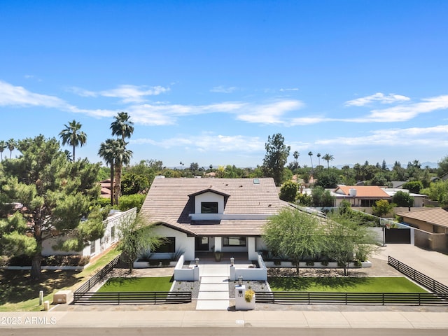 101 E Linger Ln, Phoenix, AZ 85020 - view of front facade with a fenced front yard, a tile roof, and stucco siding