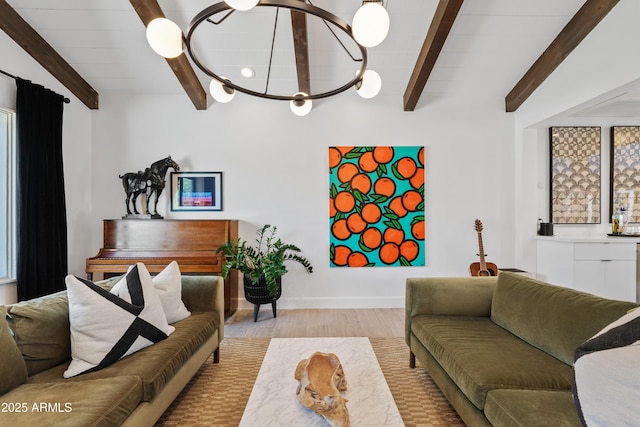 101 E Linger Ln, Phoenix, AZ 85020 - living room featuring beam ceiling, wood finished floors, and baseboards