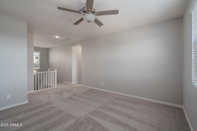 empty room with light carpet and baseboards