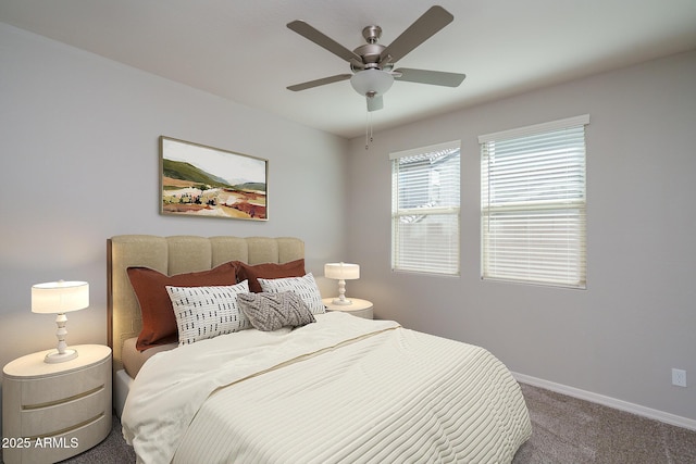 carpeted bedroom featuring a ceiling fan and baseboards