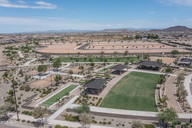 birds eye view of property featuring a mountain view