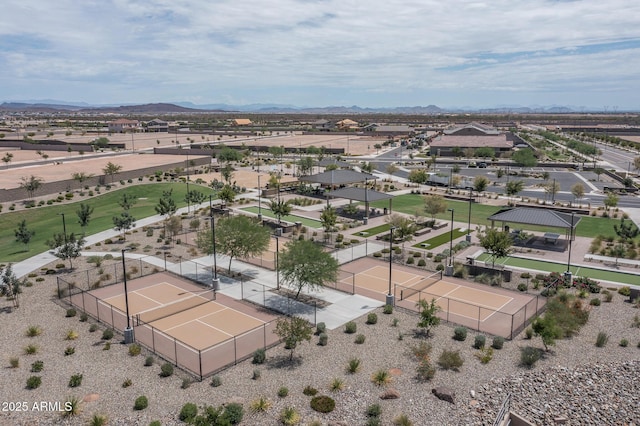 birds eye view of property featuring a mountain view