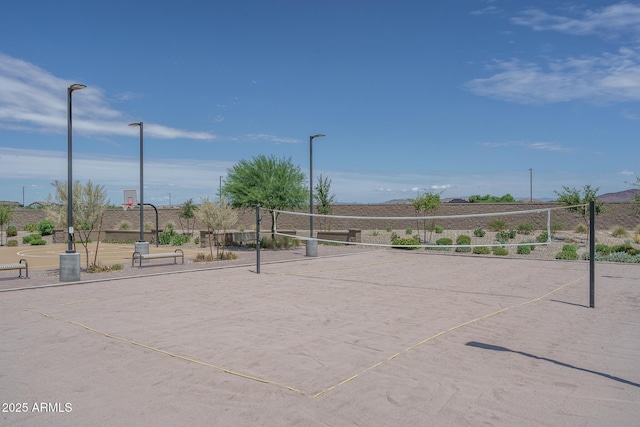 view of property's community with volleyball court and community basketball court