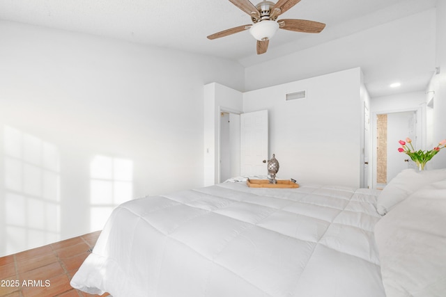 bedroom with lofted ceiling and ceiling fan