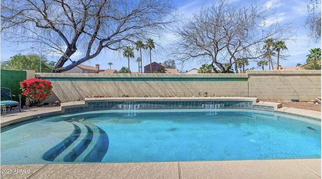 view of swimming pool with a fenced in pool and a fenced backyard