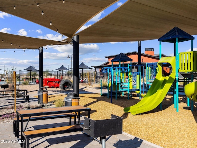 community jungle gym with fence