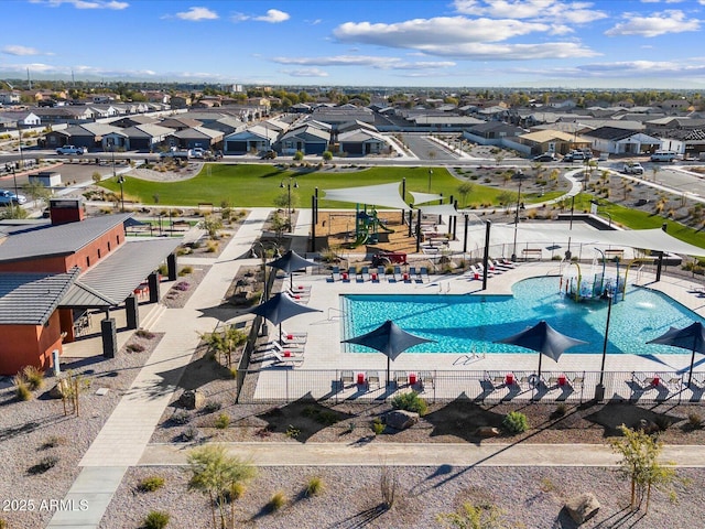 aerial view of residential area featuring a pool area