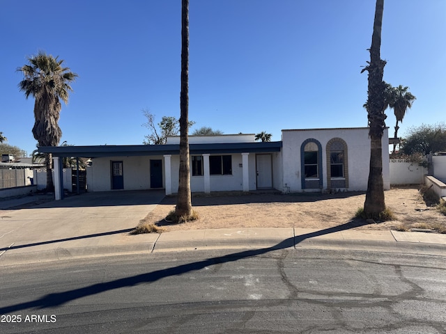 view of front of house featuring a carport