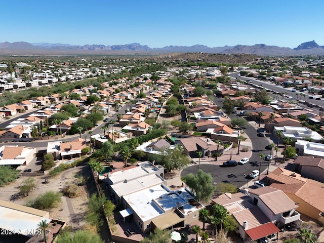 birds eye view of property featuring a mountain view