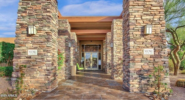 doorway to property featuring french doors