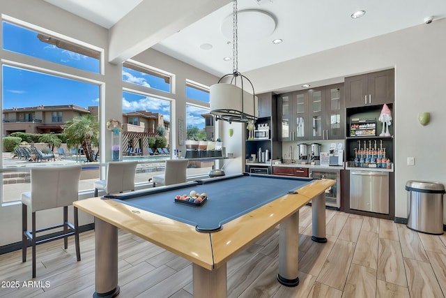 rec room with wine cooler, pool table, and wood tiled floor