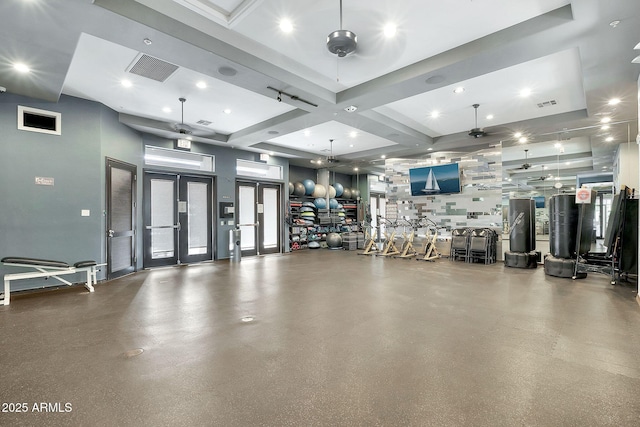 garage with visible vents and a ceiling fan