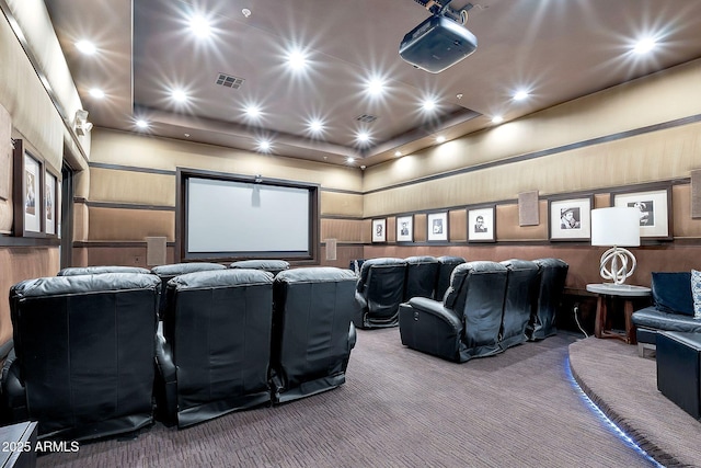 cinema featuring visible vents, carpet, recessed lighting, and a tray ceiling