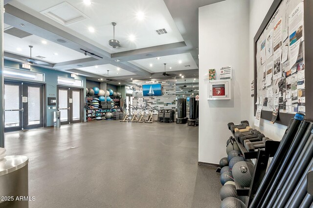 workout area featuring french doors and visible vents