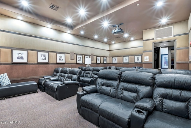 cinema room featuring visible vents, recessed lighting, and carpet flooring