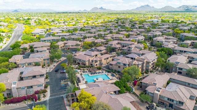 birds eye view of property with a residential view and a mountain view
