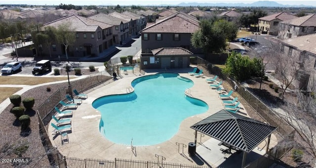 view of swimming pool with a patio