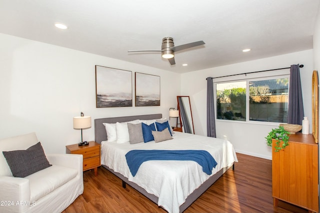 bedroom featuring baseboards, wood finished floors, a ceiling fan, and recessed lighting