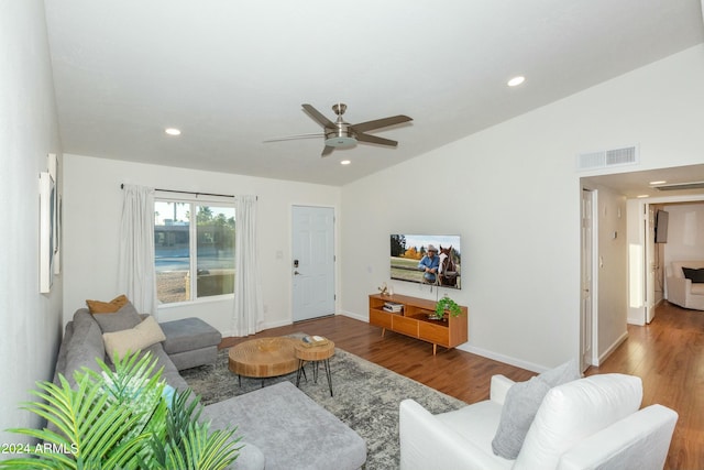 living area with visible vents, lofted ceiling, ceiling fan, wood finished floors, and recessed lighting