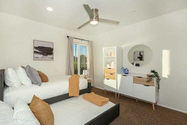 bedroom featuring recessed lighting, dark carpet, baseboards, and ceiling fan