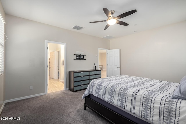 1952 N 212th Ln, Buckeye, AZ 85396 - bedroom with visible vents, carpet flooring, baseboards, and a ceiling fan