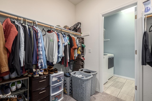 spacious closet with washer / clothes dryer