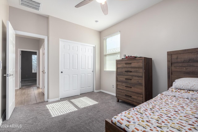 1952 N 212th Ln, Buckeye, AZ 85396 - carpeted bedroom featuring baseboards, visible vents, ceiling fan, and a closet