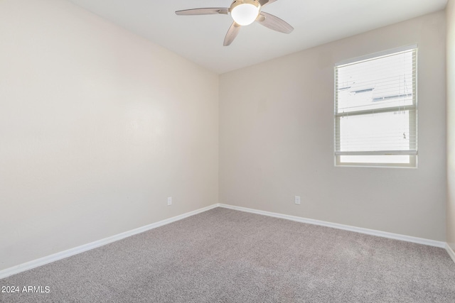 1952 N 212th Ln, Buckeye, AZ 85396 - carpeted spare room featuring baseboards, ceiling fan, and a wealth of natural light
