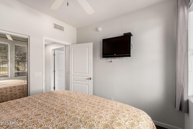 bedroom featuring a ceiling fan and visible vents