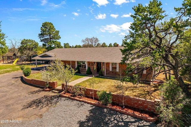 541 W Deuce Of Clubs, Show Low, AZ 85901 - ranch-style house featuring brick siding, a shingled roof, a carport, driveway, and a front lawn