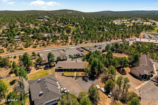 541 W Deuce Of Clubs, Show Low, AZ 85901 - birds eye view of property with a mountain view and a forest view
