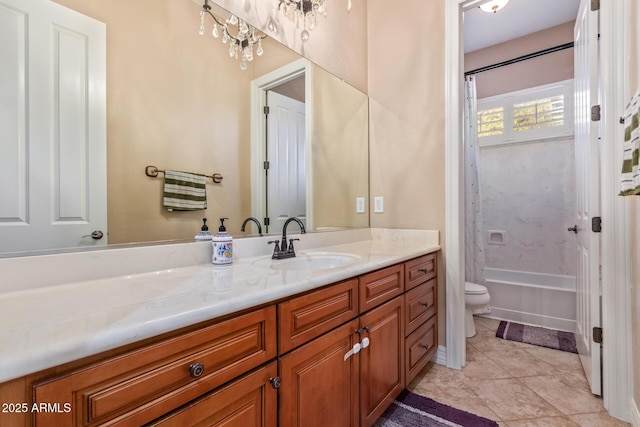 full bathroom featuring toilet, vanity, tile patterned floors, and shower / bath combo with shower curtain