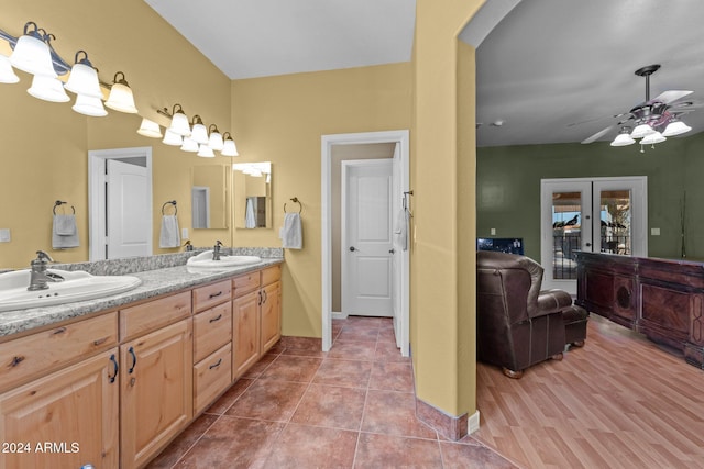 bathroom featuring vanity, wood-type flooring, and ceiling fan