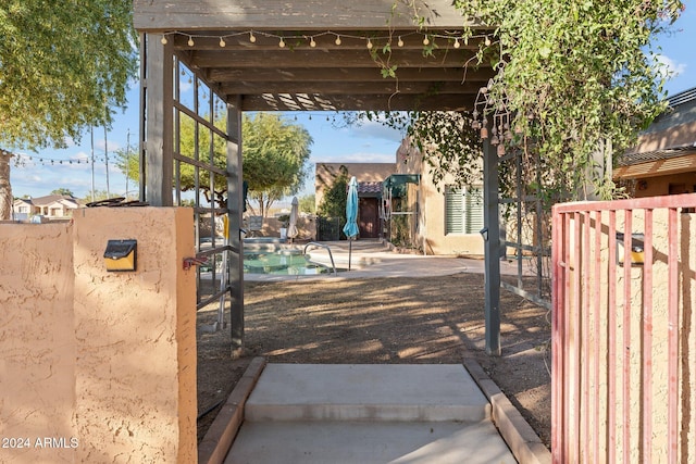 view of patio / terrace featuring a fenced in pool