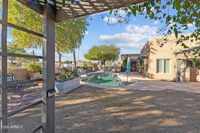 view of pool featuring a patio area and a pergola