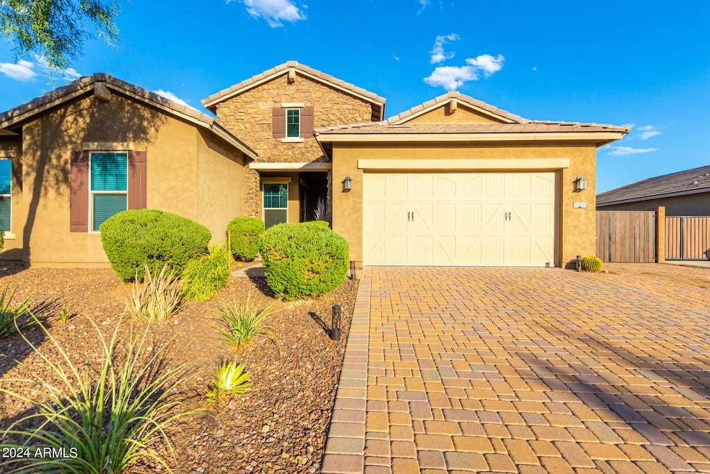 view of front of property featuring a garage