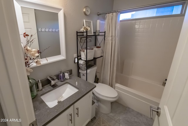 full bathroom with shower / tub combo, tile patterned flooring, vanity, and toilet