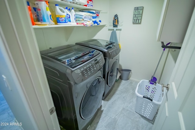 laundry area with separate washer and dryer