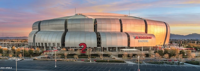 view of outdoor building at dusk