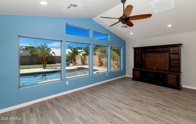 6457 E Encanto St, Mesa, AZ 85205 - unfurnished living room featuring a ceiling fan, visible vents, and lofted ceiling