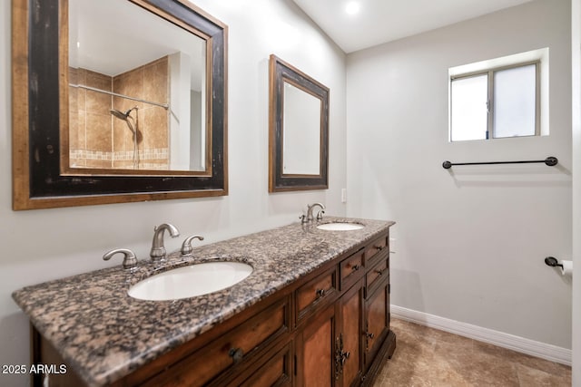 6457 E Encanto St, Mesa, AZ 85205 - full bathroom featuring baseboards, double vanity, and a sink